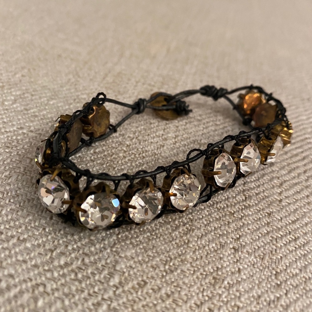 Black wrap bracelet with gold embellishments